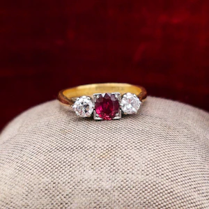 Downstairs at Grays: A very fine Three Stone Ruby & Diamond Engagement Ring mounted in 18ct Yellow Gold & Platinum, Circa 1950