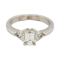 Emerald cut diamond ring with triangular cut diamond shoulders - image 1