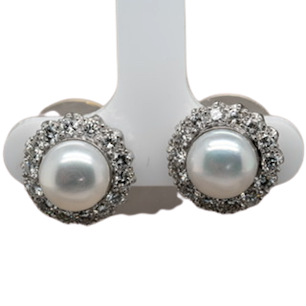 Cultured pearl and diamond earrings mounted in platinum - image 1