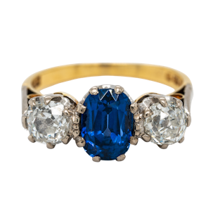 Three stone sapphire and diamond ring