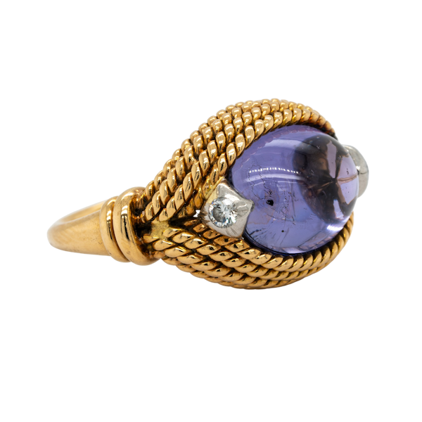 An unusual Marchak ring with a large central purple sapphire - image 1