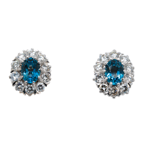 Blue topaz and diamond cluster earrings