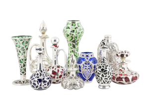 Beautiful collection of stunning glass silver overlay perfume bottles and bud vases