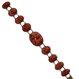 Gold mounted coral cameo bracelet
