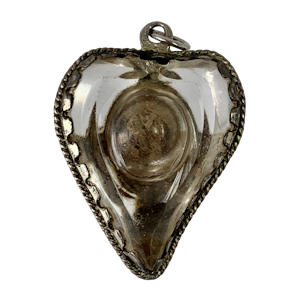 Seventeenth century silver and rock crystal reliquary with the original relic inside