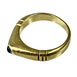 Gold and sapphire stirrup ring