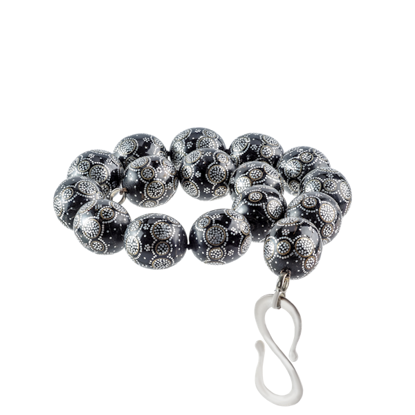 A Necklace of Black Coral Beads with Silver Inlay - image 1