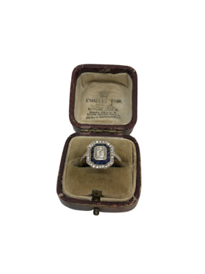 Emerald cut diamond sapphire target ring