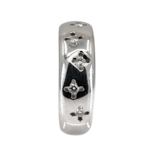 Very thick 18 ct white gold band ring set with small diamonds