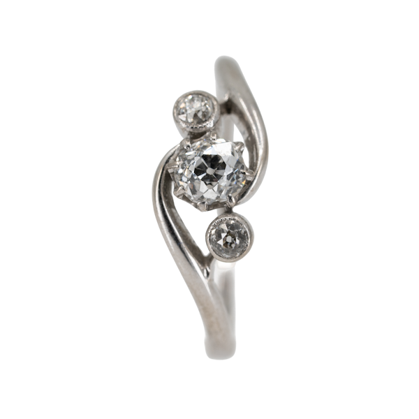 3 stone crossover diamond ring set in platinum - image 1