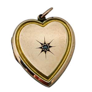 Diamond and 9ct Victorian heart opening locket. Spectrum