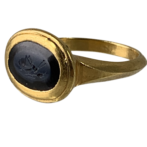 Ancient intaglio of an ant and grain of wheat