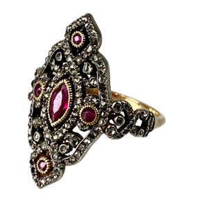 Diamond ring with rubies