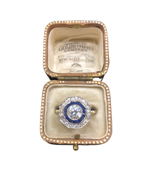 Deco style hexagonal shape diamond sapphire target ring