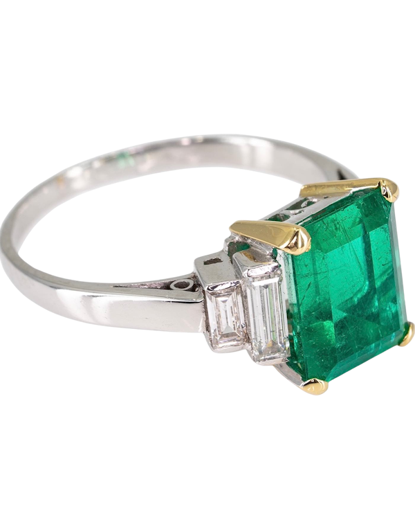 Fine emerald ring certificated ,Colombian ,2.50 carat with stepdown diamonds each side and mounted in plarinum - image 1