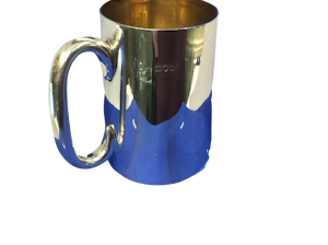 A solid silver pint tankard