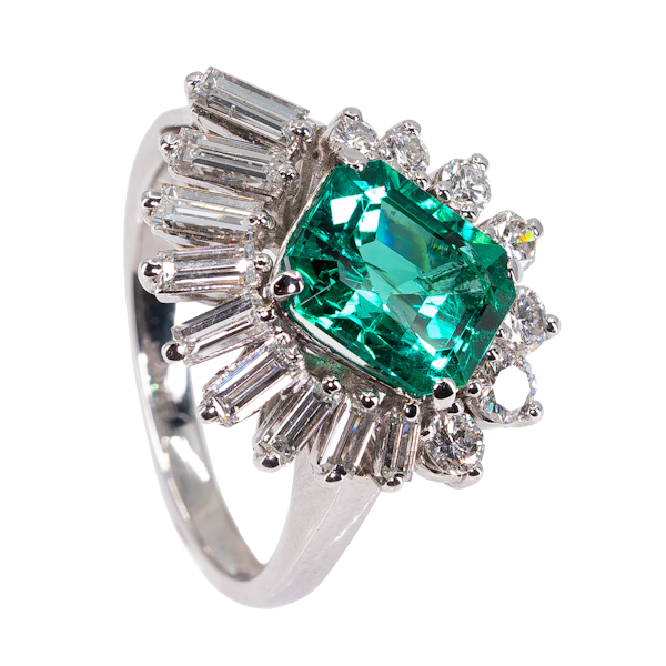 A Fine Emerald Dress Ring Offered by The Gilded Lily. - image 1