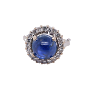 Retro sapphire cabochon and diamond cluster ring