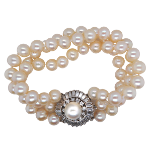 Diamond and pearl bracelet with fancy diamond clasp. Diamonds 3.0 cts. total est.