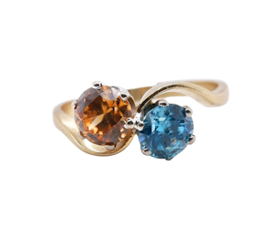 Retro 18 ct. gold crossover ring with blue zircon and golden zircon