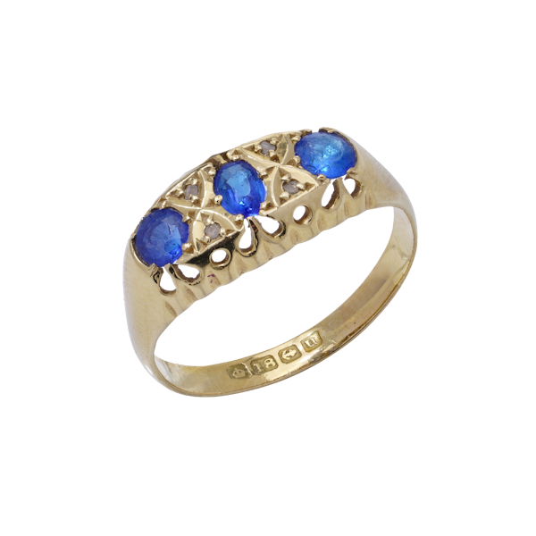 18kt gold three - stone sapphire ring - image 1