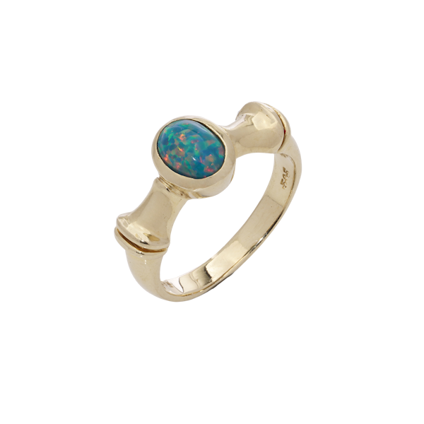 Vintage 14kt gold ring featuring a vibrant black opal - image 1