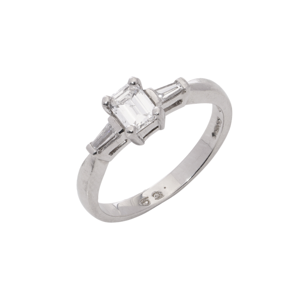 platinum ring featuring an elegant emerald-cut diamond - image 1