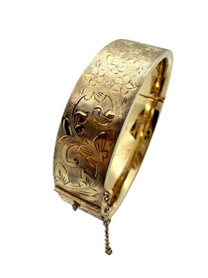 Gold bangle.