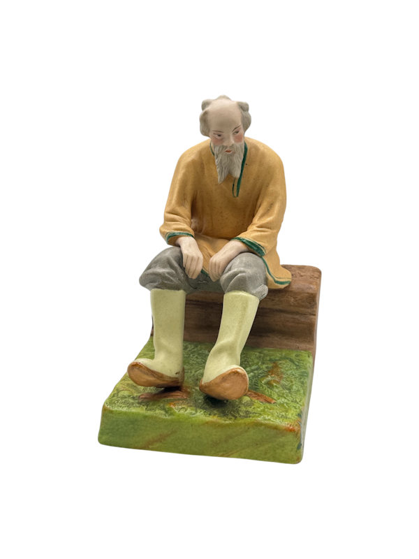 Russian porcelain figure of an old man sitting by Dimetrov Factory after famous gardener producer, c1930s. - image 1