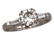 Diamond solitaire ring with diamond baguettes shoulders - image 1