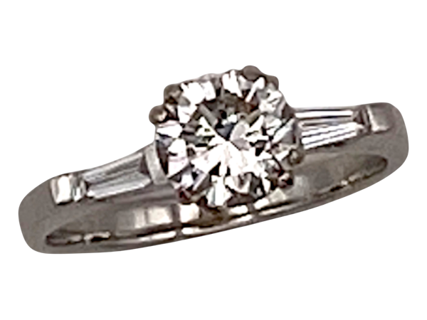 Diamond solitaire ring with diamond baguettes shoulders - image 1
