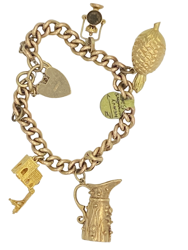 Victorian 9 ct. gold curb bracelet with charms (including an opening charm of a church with bride and groom standing) - image 1