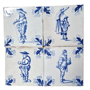 Set of four Dutch tiles showing figures dressed in different costumes circa 1650