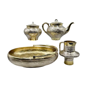 19th century Russian silver gilt trompe l'oeil four piece tea set, St Peterburg.