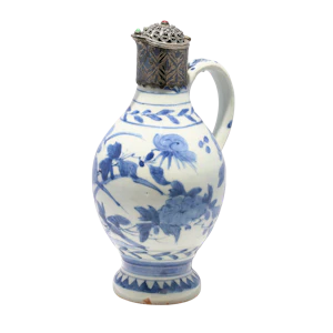 A 17th century Arita ware blue and white porcelain ewer with 19th century Ottoman silver and gem set mounts.