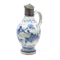 A 17th century Arita ware blue and white porcelain ewer with 19th century Ottoman silver and gem set mounts. - image 1