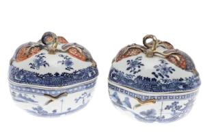 A PAIR OF BLUE AND WHITE POMEGRANATE TUREENS AND COVERS