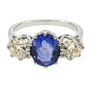 Oval sapphire & diamond 3 stone ring, platinum.